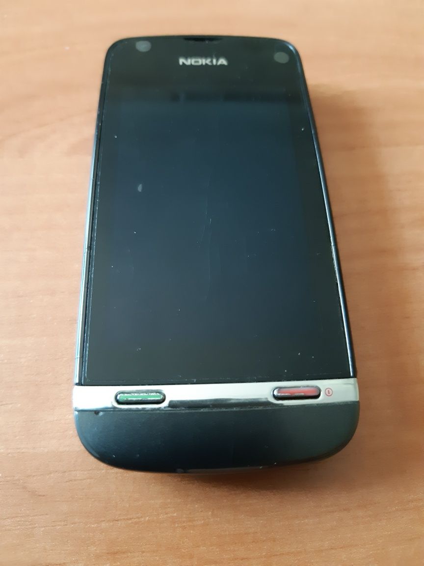 Nokia 311 мобильный телефон б/у, в рабочем состоянии.