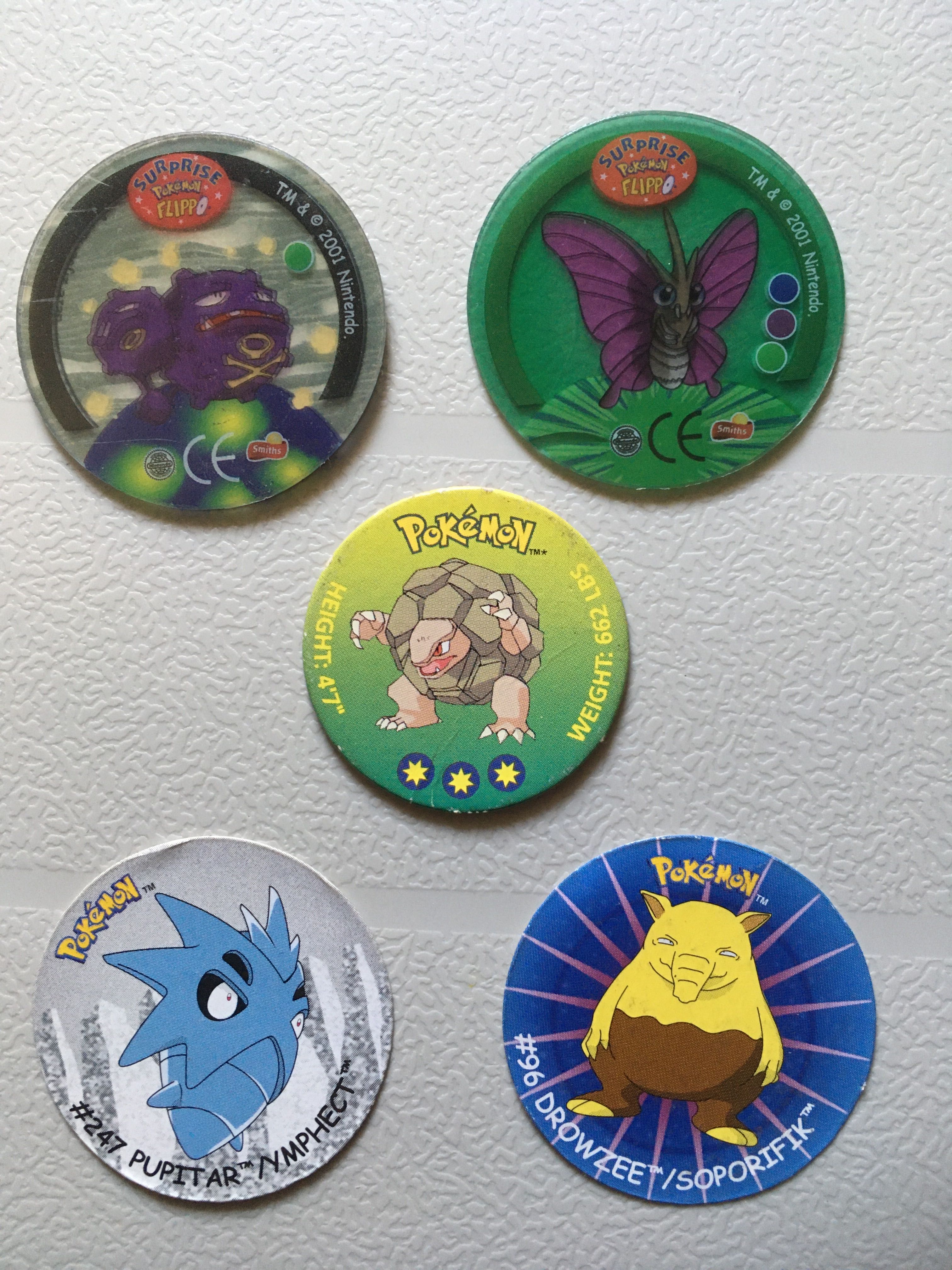 Conjunto tazos Pokémon  + Pokébolas