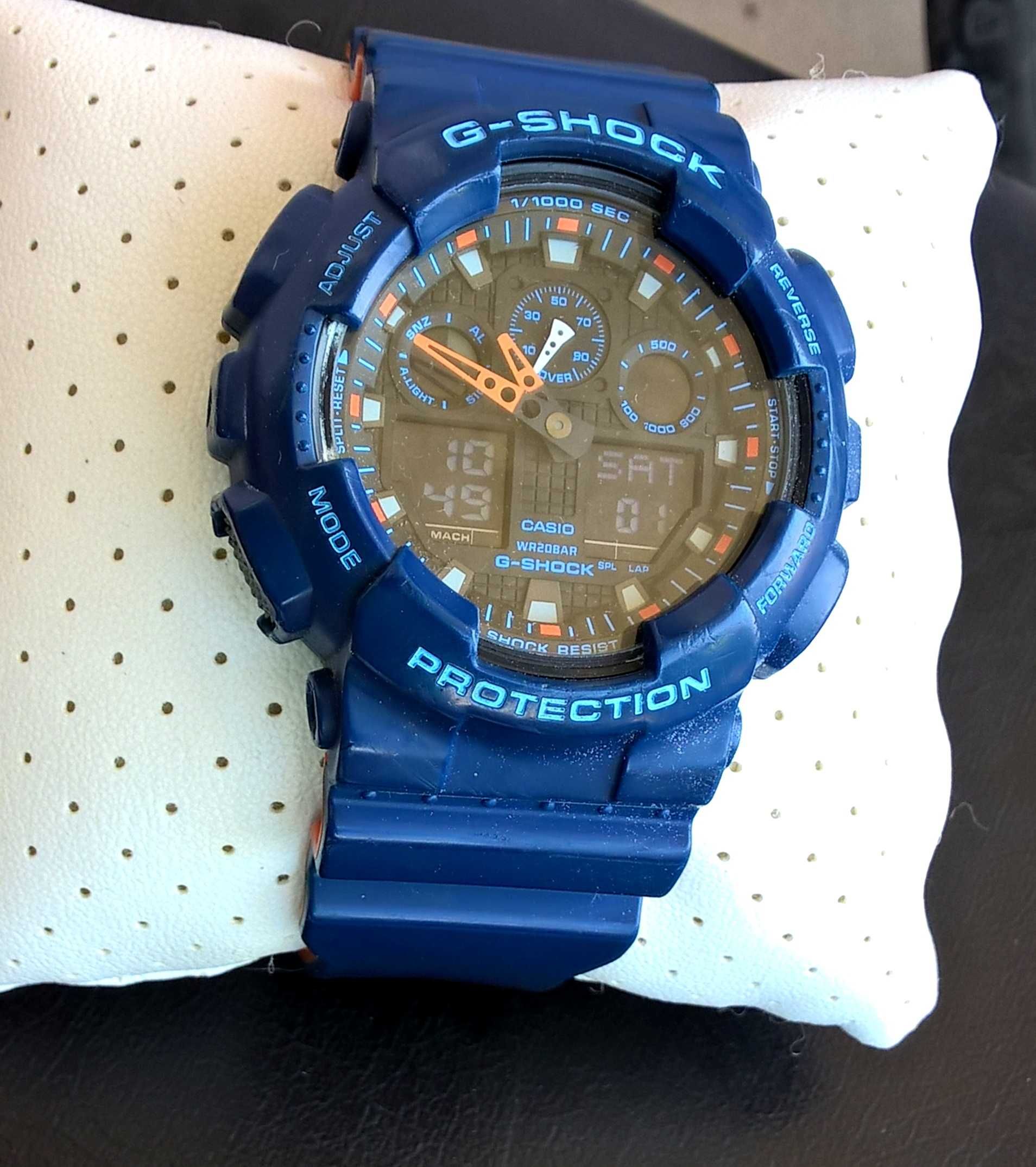 CASIO G-Shock GA-100L-2AER Niebiesko-Pomarańczowy