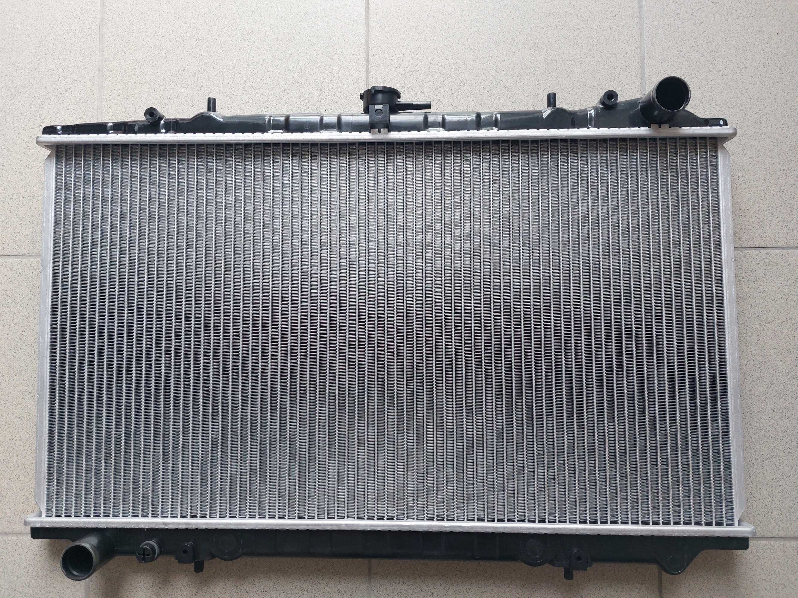 Радиатор охлаждения Nissan Prarie II 88-95 Nissan bluebird