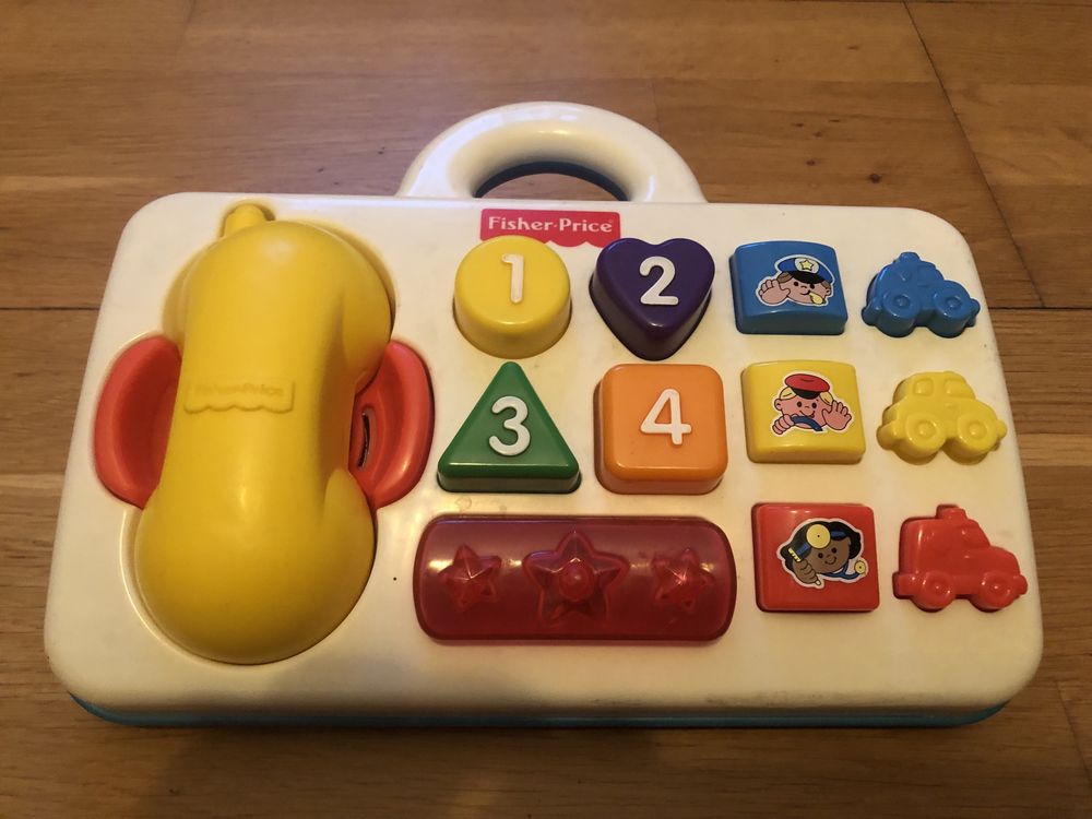 Fisher Price telefon z bazą gra i mówi