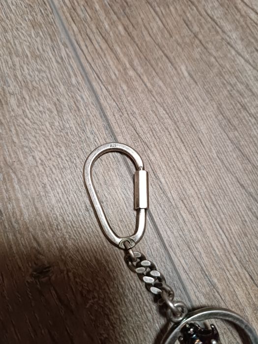 Серебряный брелок на ключи.