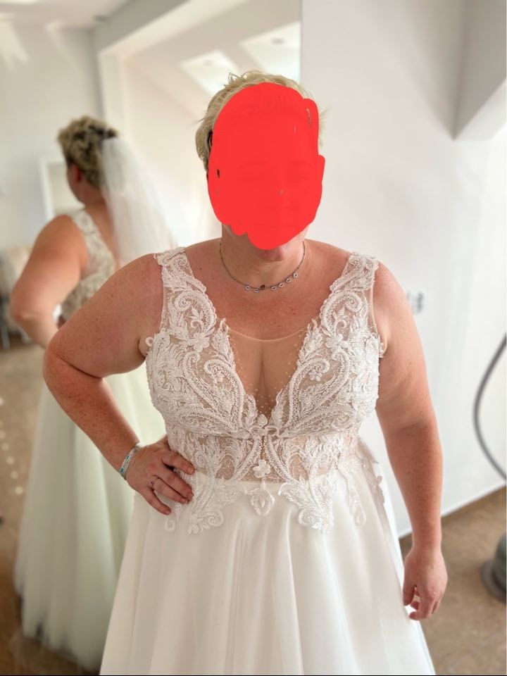 Suknia ślubna gorsetowa plus size