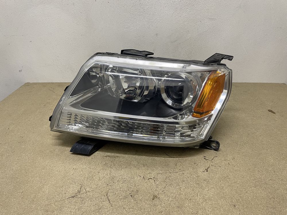 Lampa lewa przód Suzuki Grand Vitara II 05- przednia EU USA