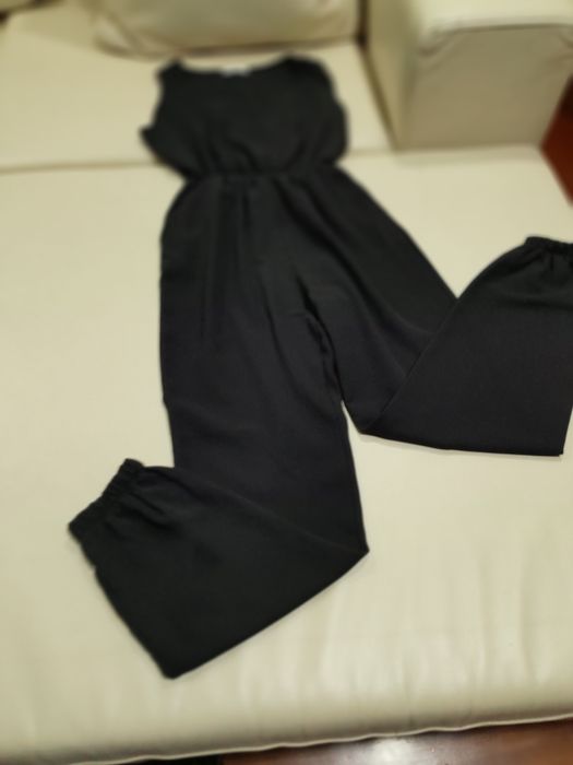 Macacão preto sem manga