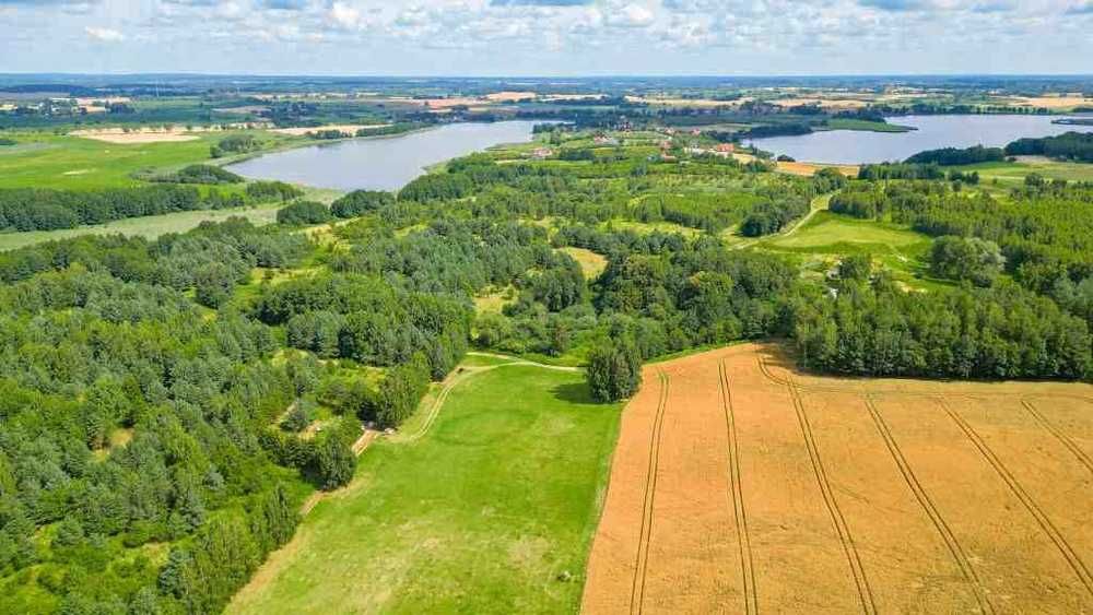 Uwaga obniżka ceny. Sprzedam działkę nad jeziorem.