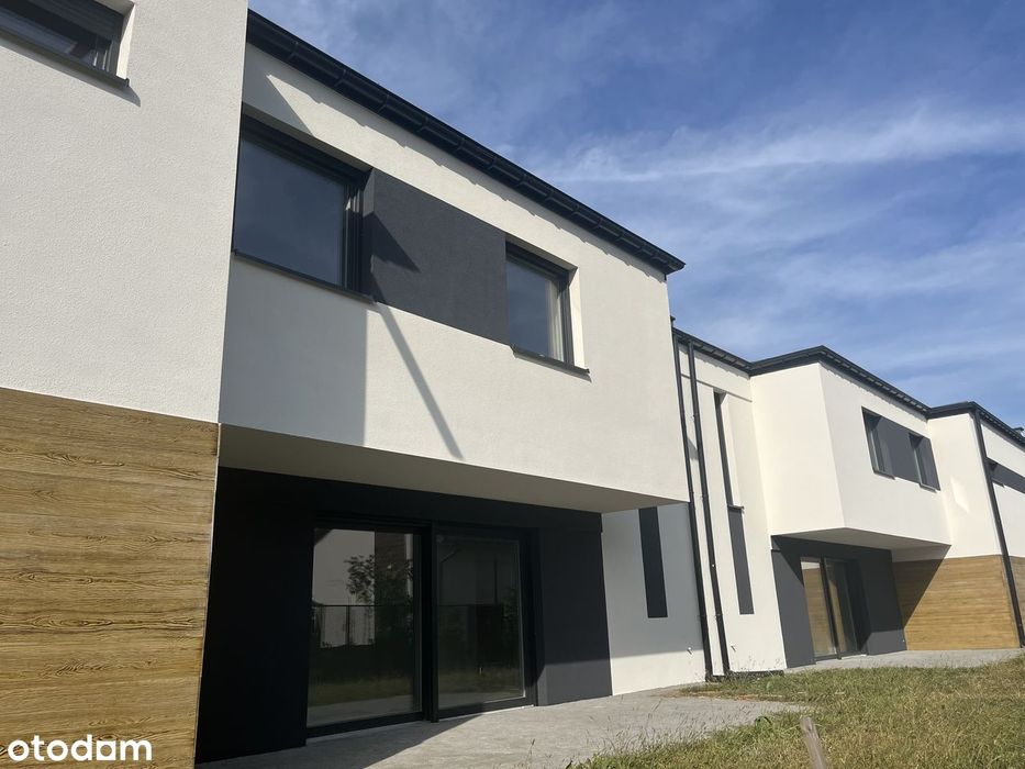 Dwupoziomowy apartament z ogródkiem w spokojnej okolicy/blisko centum