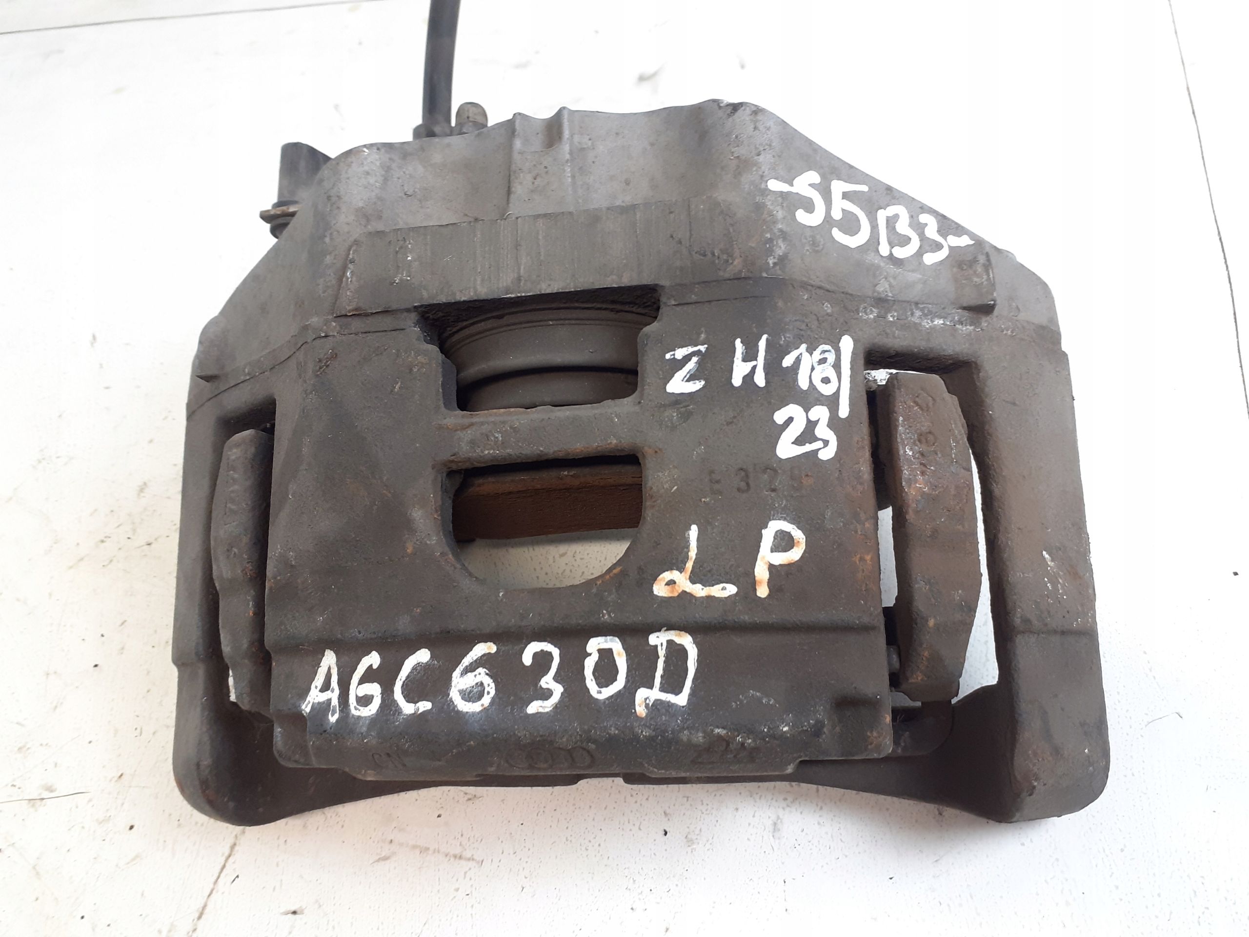 Zacisk Lewy Przod Przedni Audi A6 C6 3.0 TDI