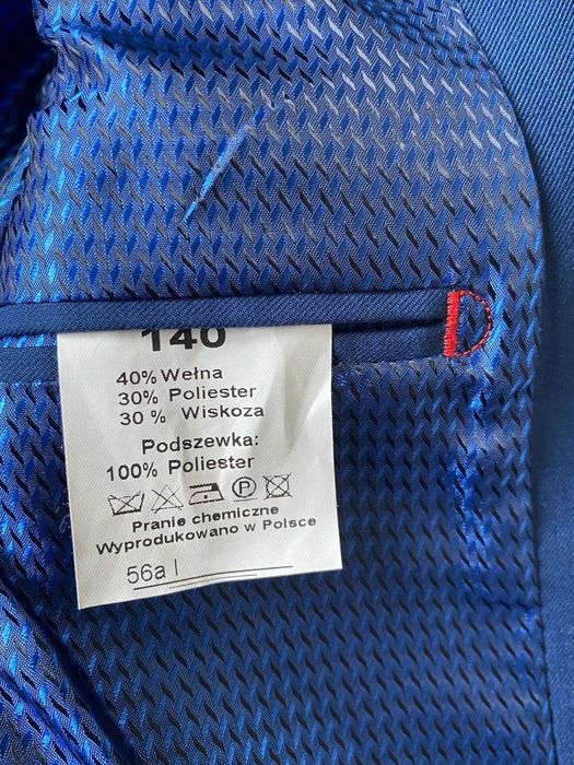 Niebieska marynarka garniturowa 140 cm polski producent s. bdb