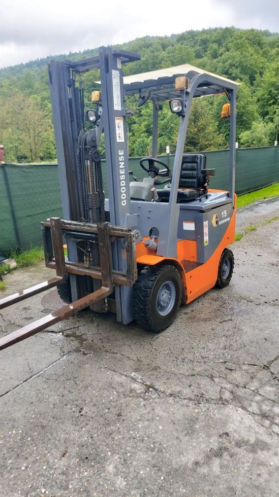 Wózek widłowy elektryczny 1.5t. Wolny skok,Przesuw boczny 2011rok
