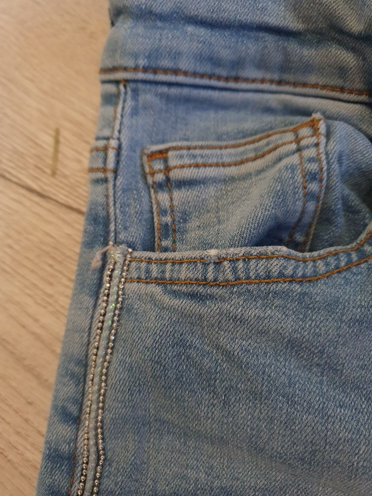 Śliczne spodnie jeansy Zara r. 36 niebieskie
