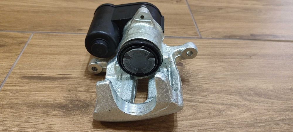 Супорт задній лівий на VW b6,B7,CC,Sharan,Tiguan Новий. 5N0 615 403