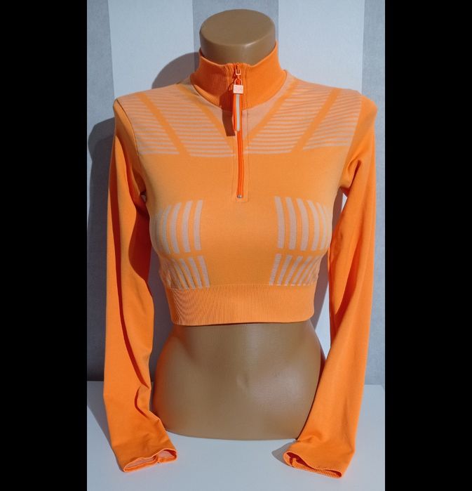Bluzka neonowa pomarańczowa zapinana na długi rękaw crop top Bershka S