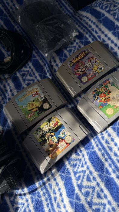Nintendo 64 + 2 comandos + 4 jogos