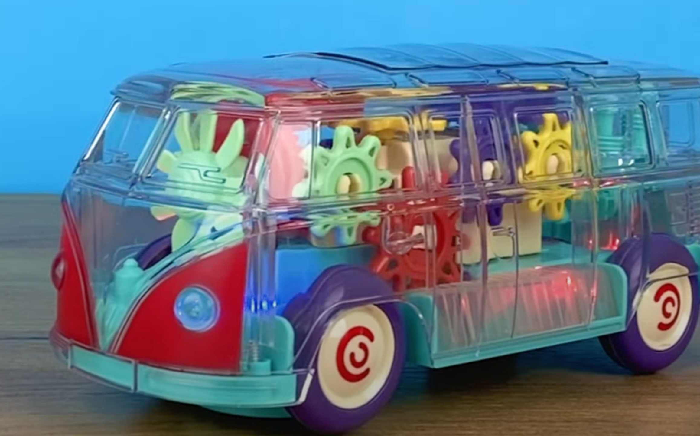 Музичний прозорий автобус з рухомими шестернями
