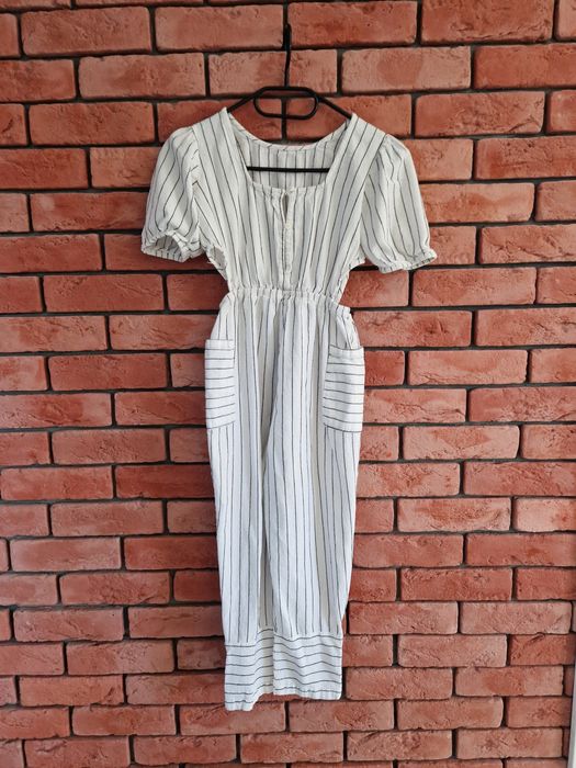 Piękny biały kombinezon w paski Primark r 146