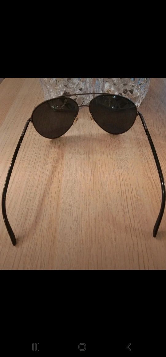 Óculos de sol Prada estilo aviador