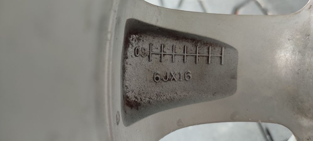 16 4x100  Nissan OE Note Micra oryginalne felgi aluminiowe SUPER STAN