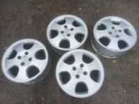 Alufelgi opel 4x100 astra corsa 15 cali