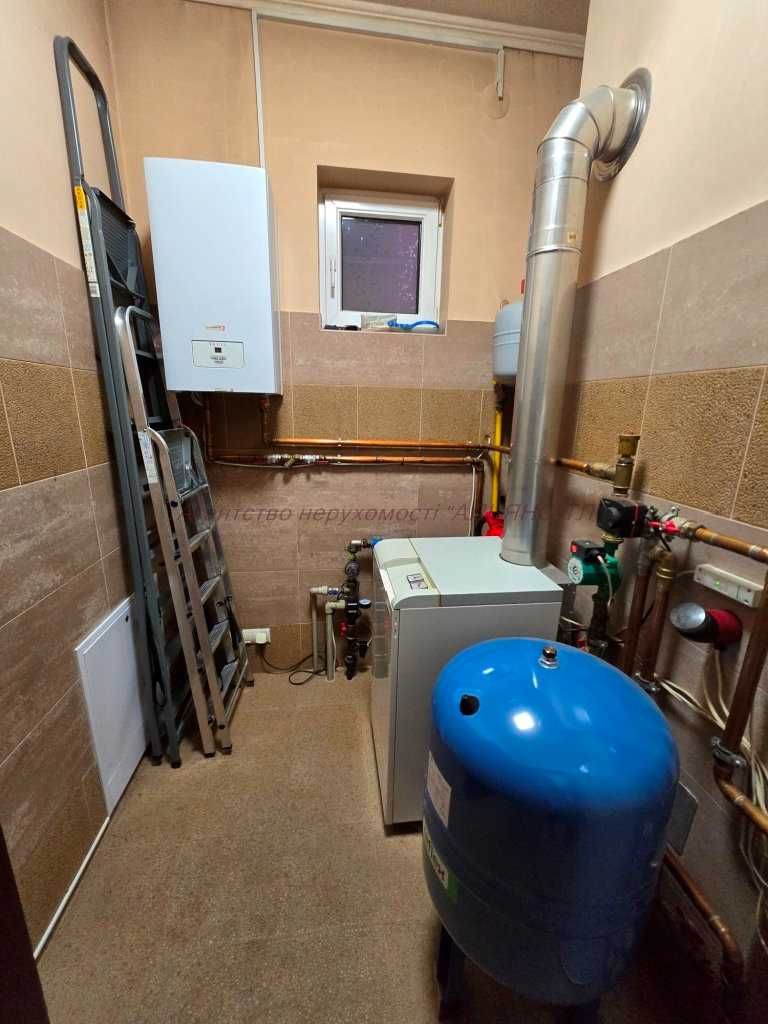 Будинок з ремонтом та меблями на ділянці 13.4 сот