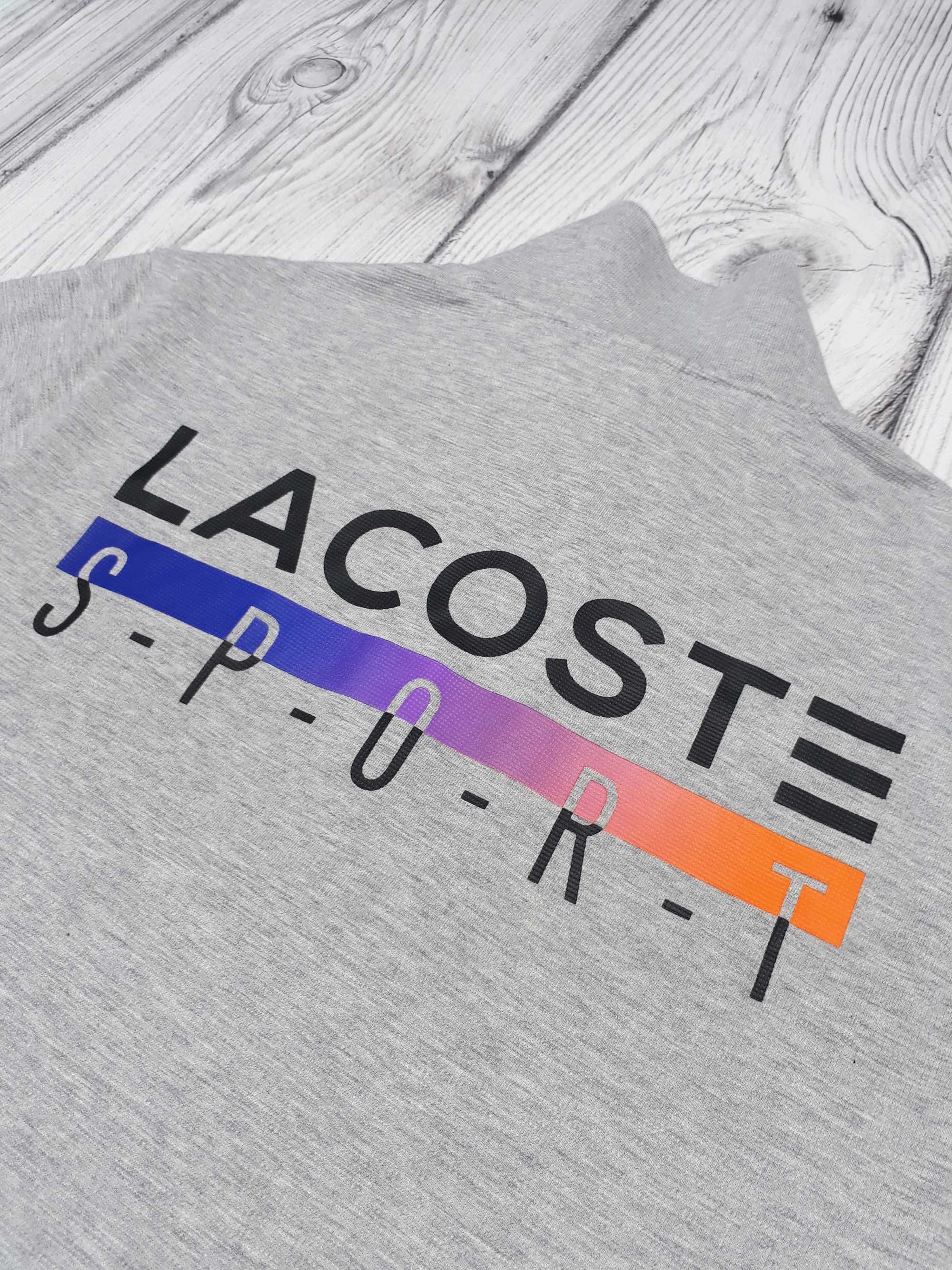 Поло на замок Lacoste футболка розмір S