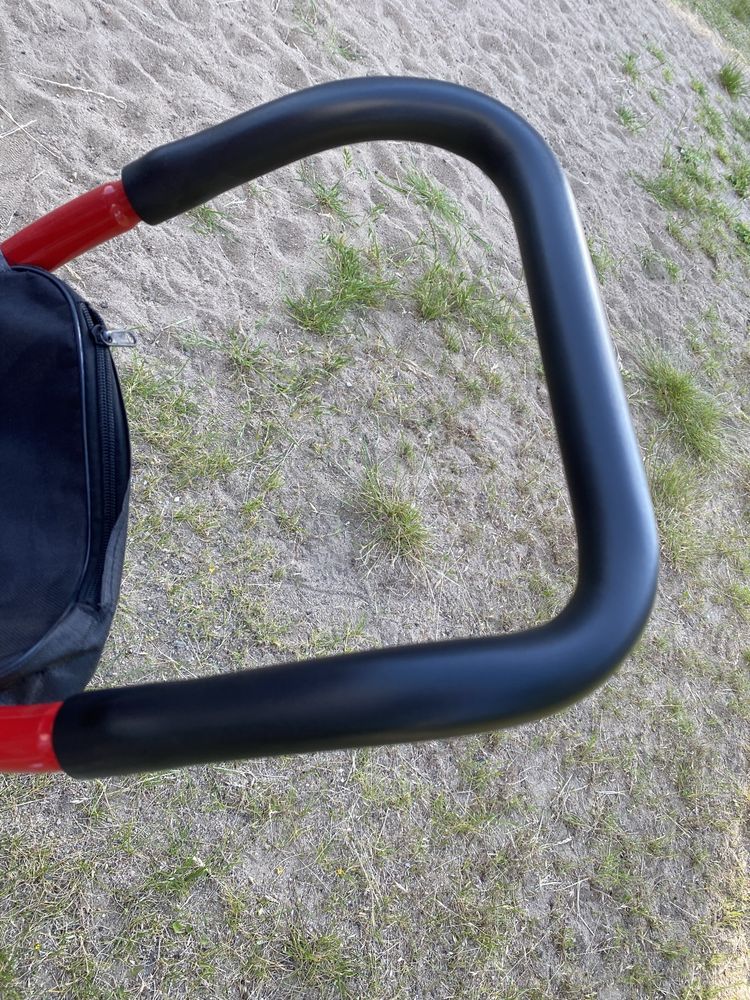 Czerwony rowerek trójkołowy dla dziecka ecotoys z rączką