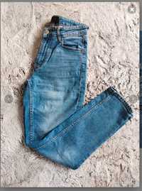 Damskie jeansy Reserved