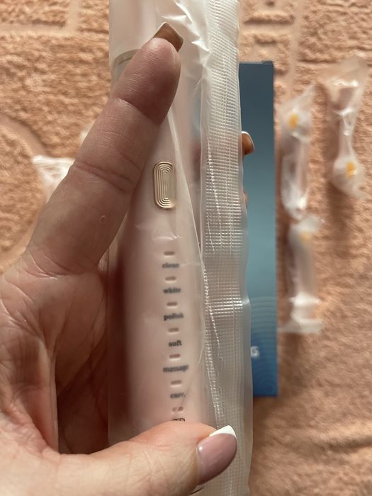 Електрична зубна щітка і насадки. США