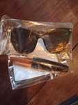 Rimel e oculos novos
