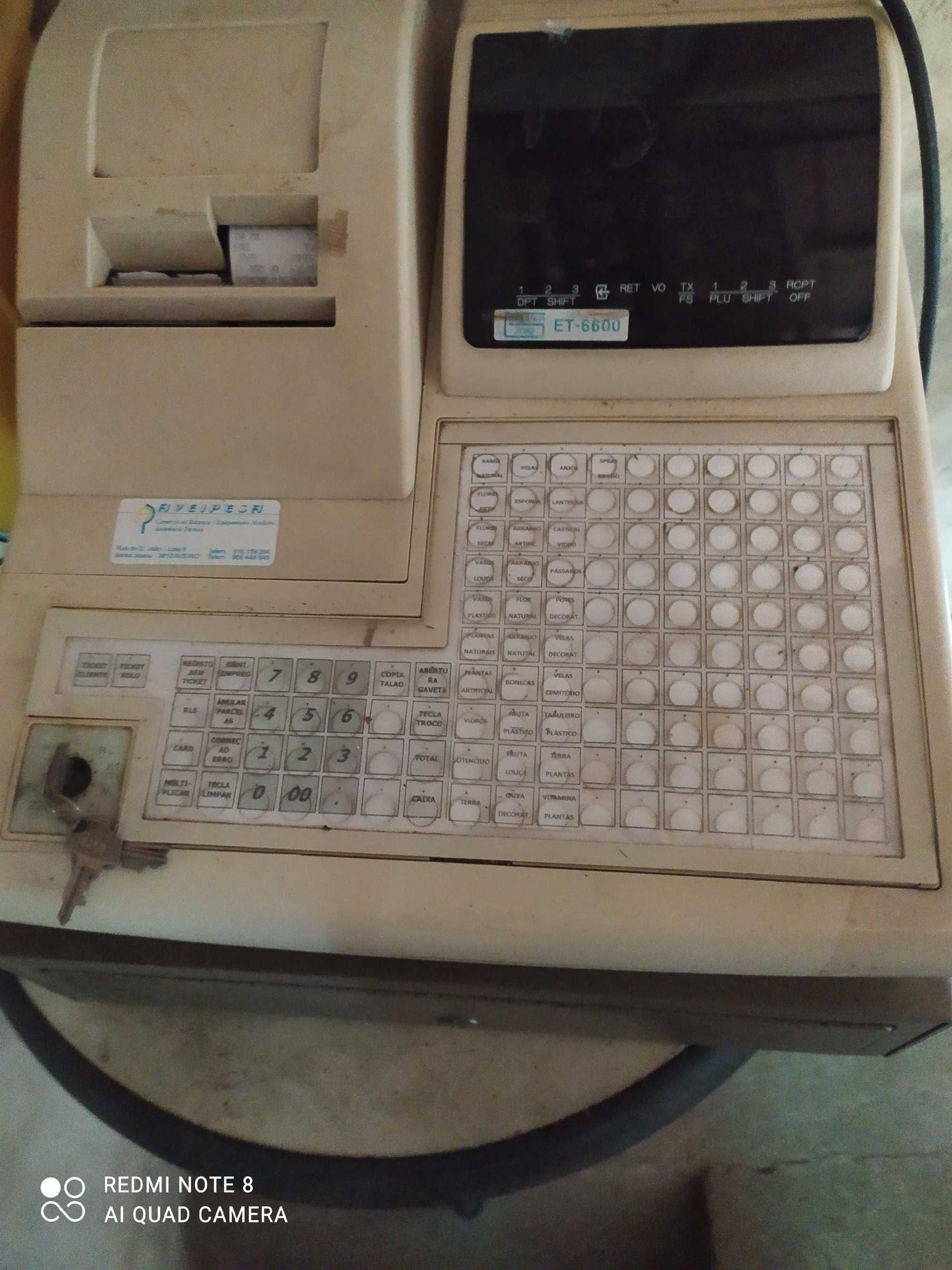 Máquina registadora a funcionar