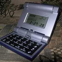 Калькулятор, часы, будильник,календарь Table clock 900
