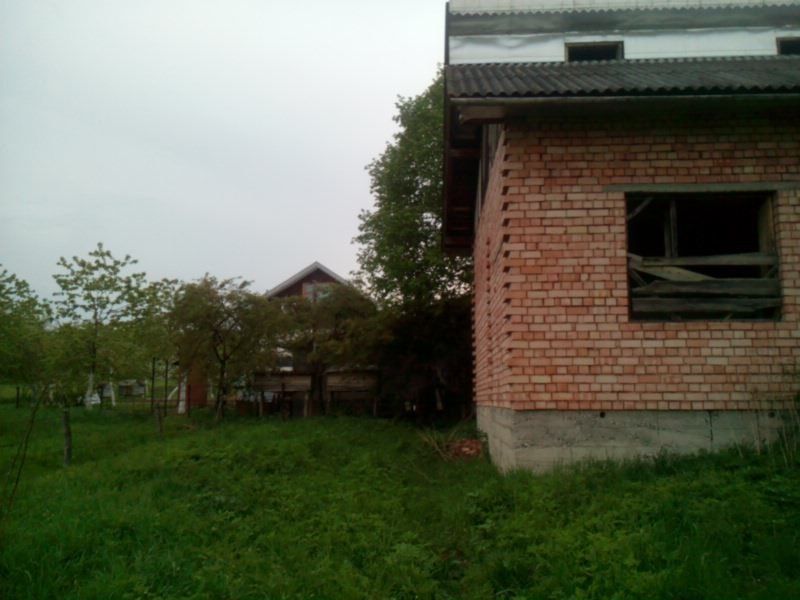 Земельна ділянка з будовою