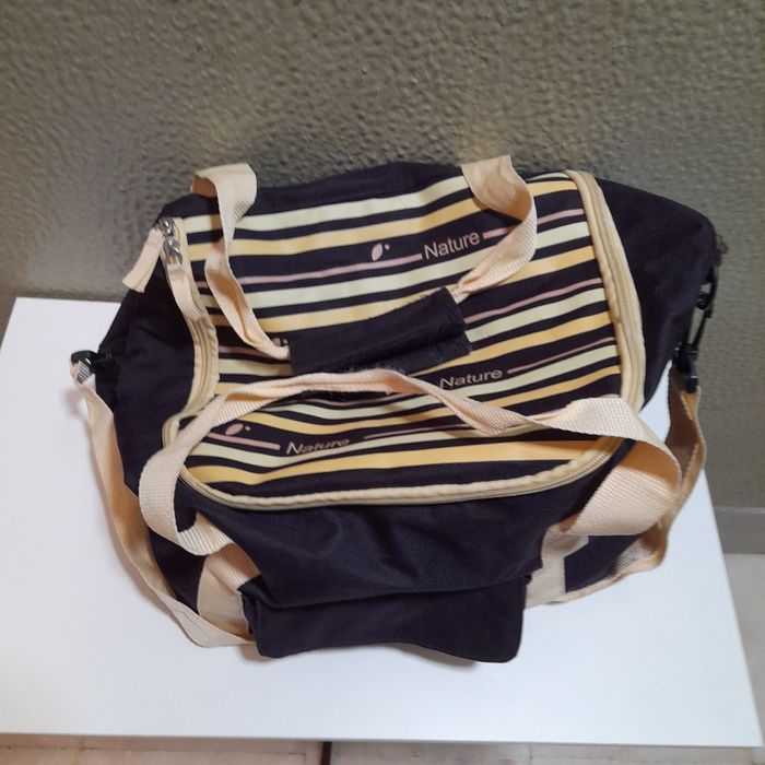 Bolsa utilitária e mala em pele