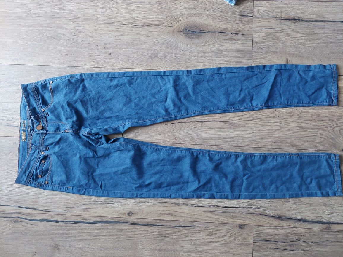 Jasnoniebieskie spodnie dżinsy skinny 34