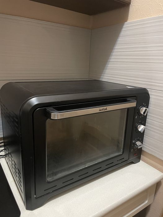 Духова шафа Tefal