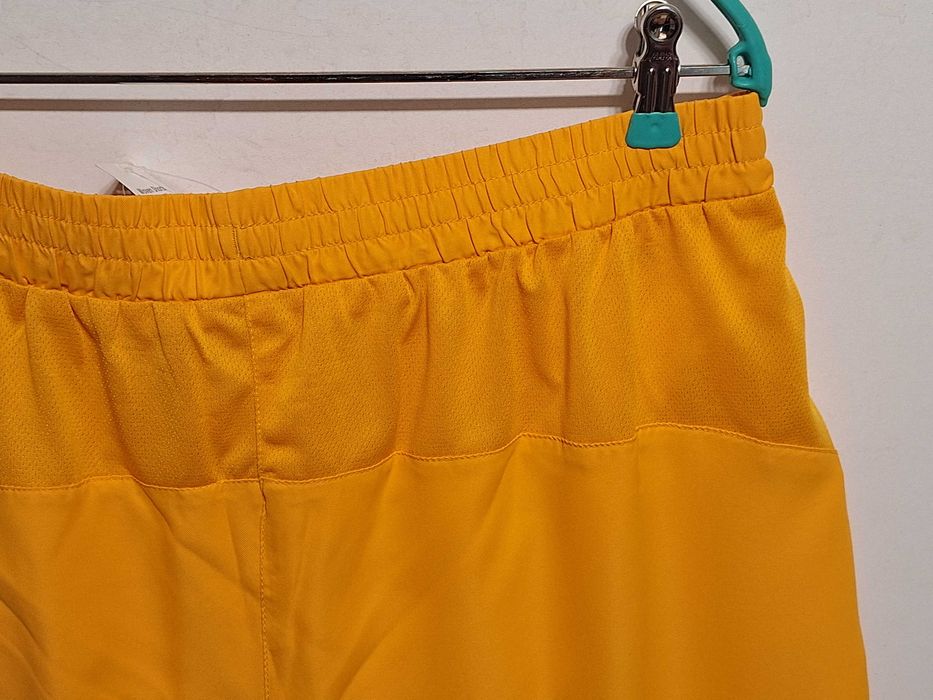 Нові жовті шорти Fila