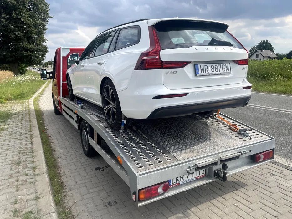 autolaweta laweta pomoc drogowa transpor koparek maszyn Janow lubelski