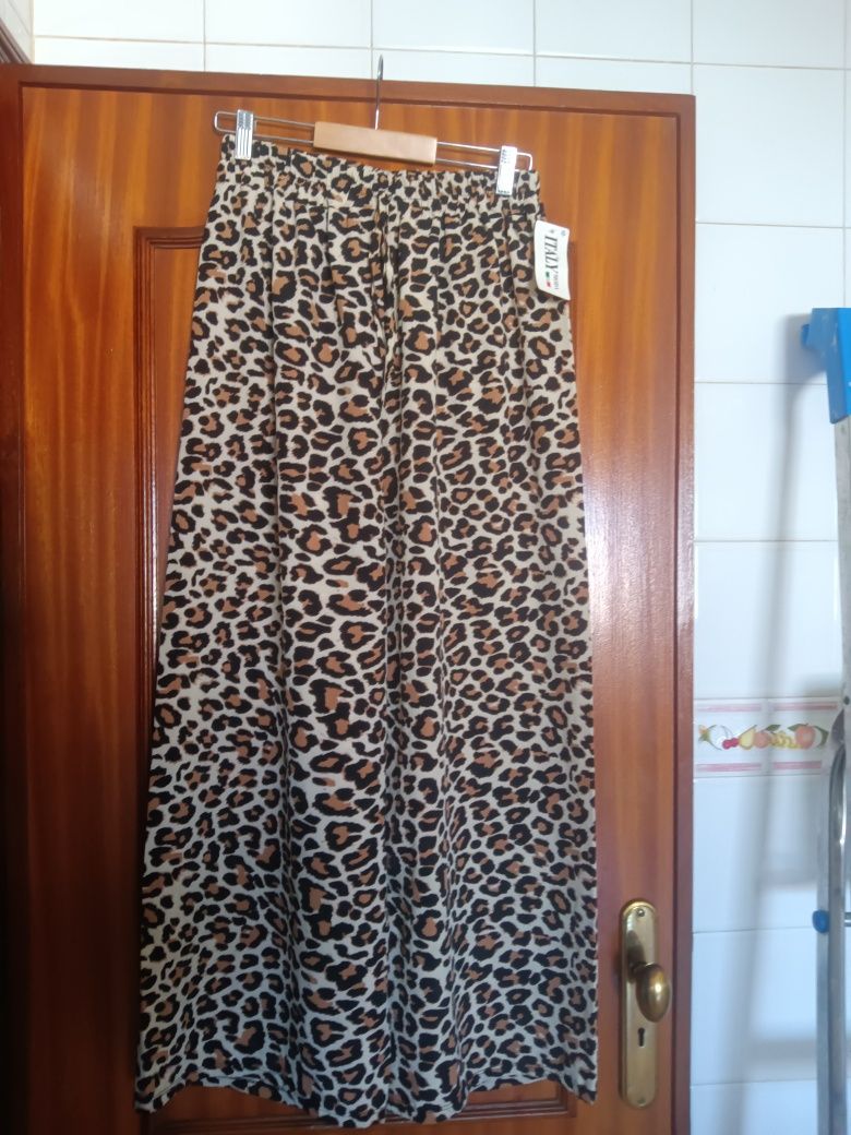 Conjunto tigresa , veste até XL stock de loja k fechou
