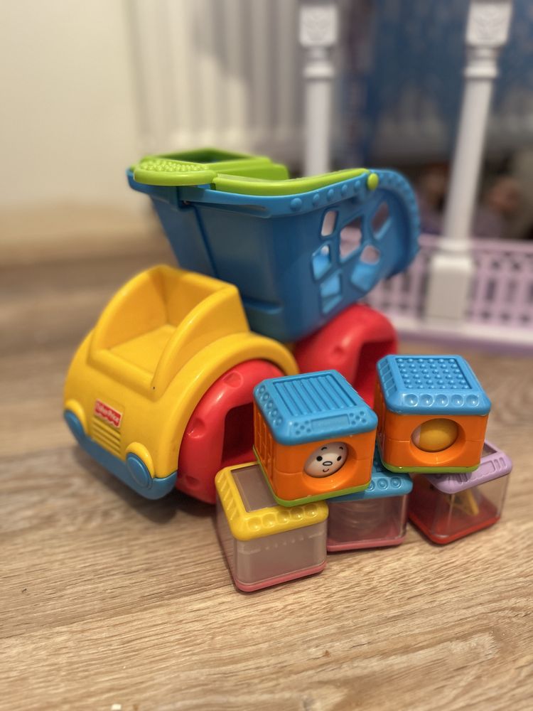 Interaktywna wywrotka z klockami fisher price