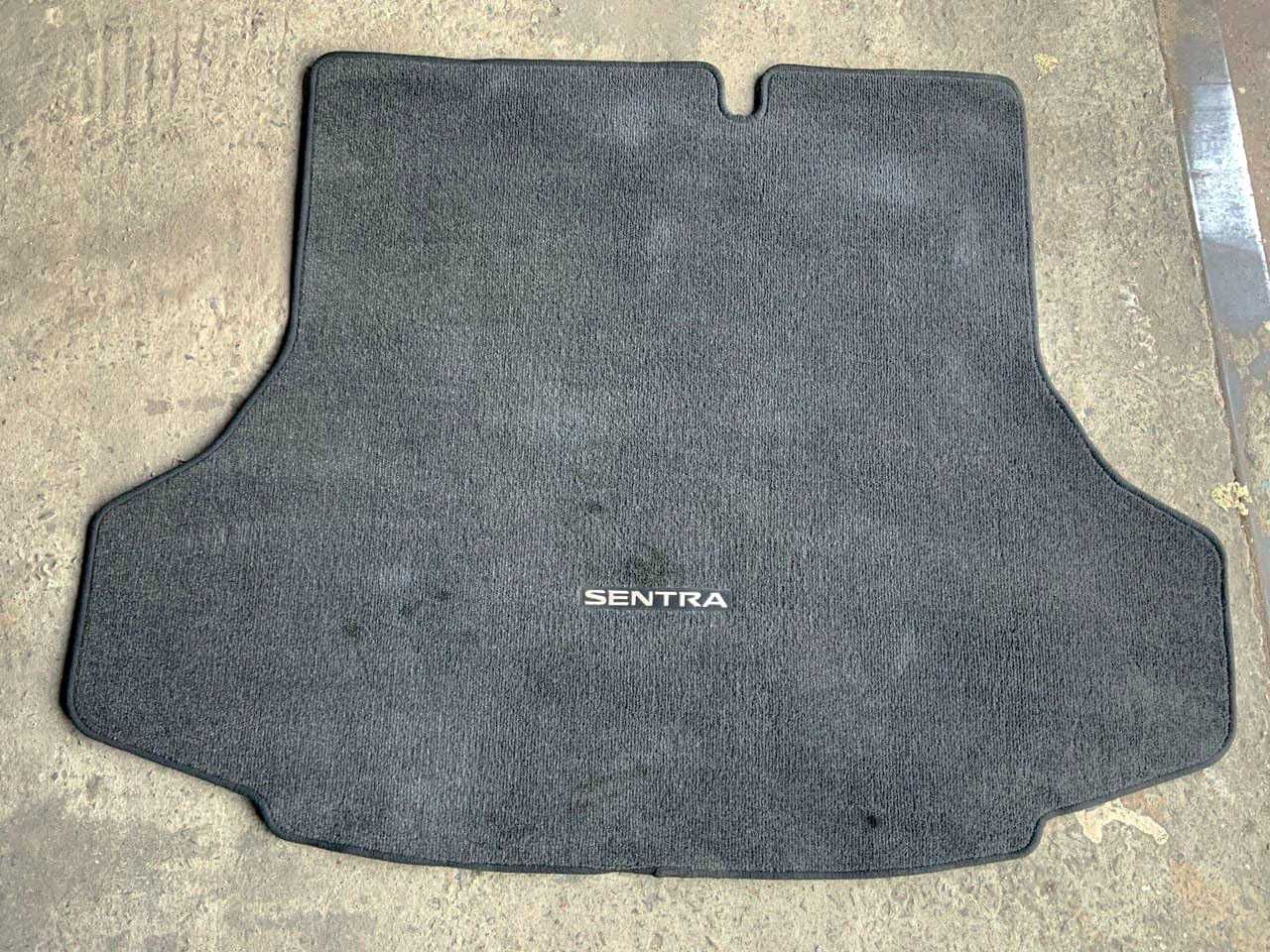 Коврик настил в багажник Nissan Sentra 13-19 оригинал текстильный