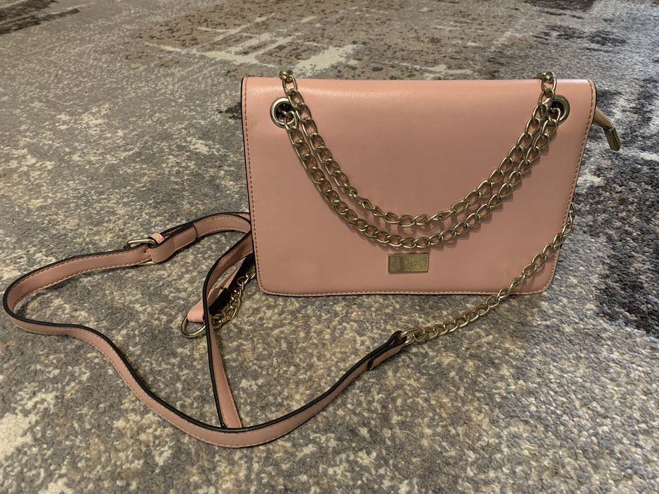 рожева сумочка