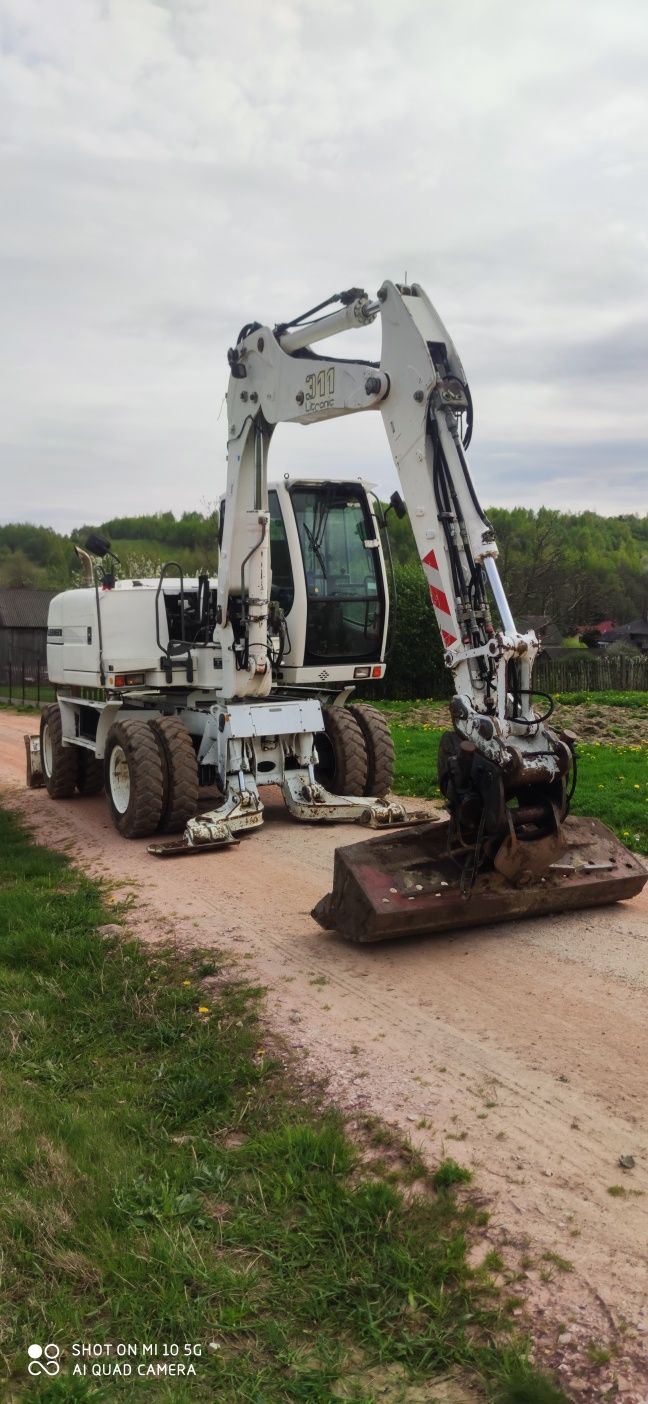 koparka kołowa Liebherr 311 /pług/podpory/centralne smarowanie /