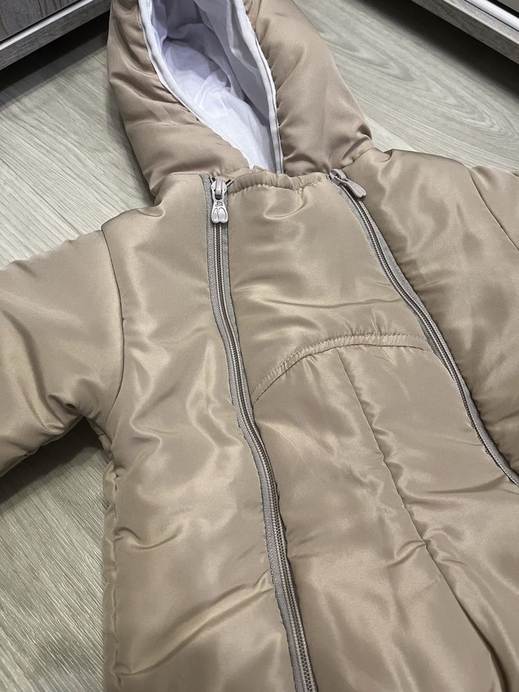 Продам новый комбинезон для малышей
