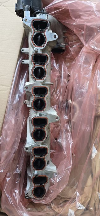 Продам  оригинал впускной коллектор бмв м50д