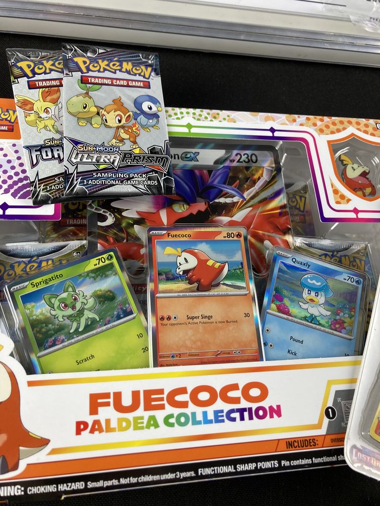 Pokemon Zestaw Album + Fuecoco pin Collection Box + scorbunny i inne