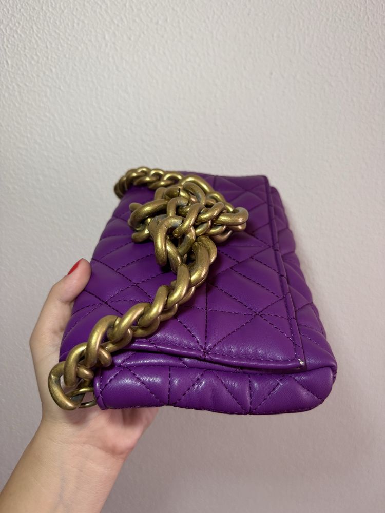 Mala roxa da Zara