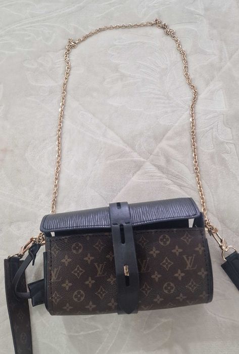 Mala nova com 2 alças tiracolo