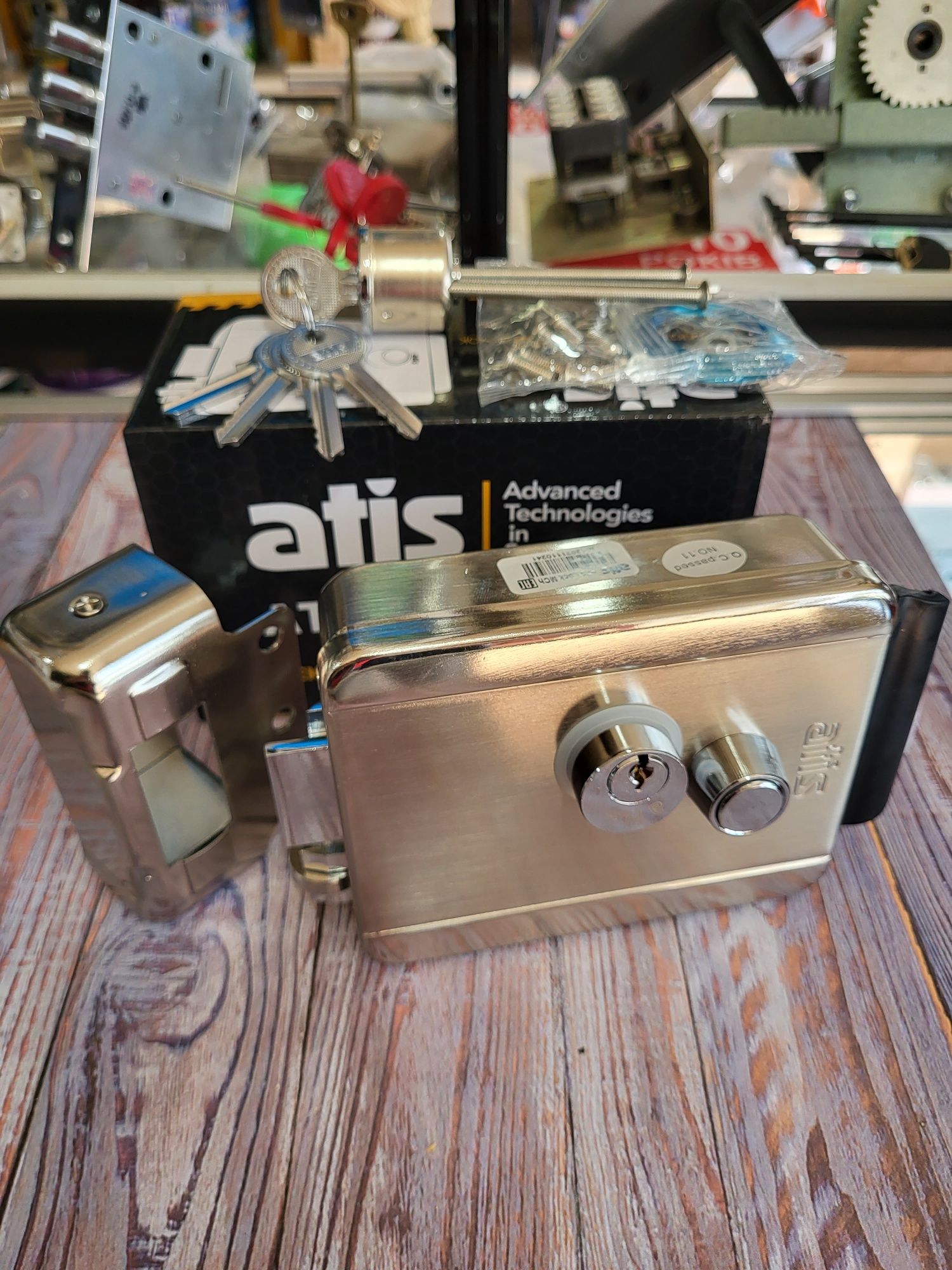 Замок накладний електромеханічний ATIS продаж монтаж ремонт