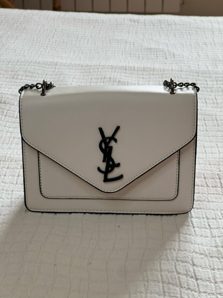 Mochila ysl mulher