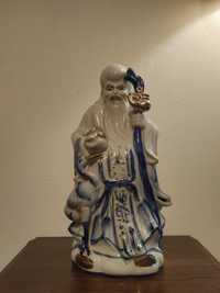 Estatueta oriental em porcelana Buda da Sabedoria